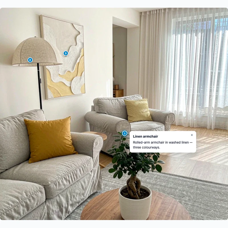 Living room photo with clickable notes on the armchair, lamp and print